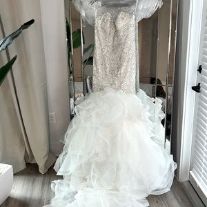 Beautiful Couture bridal dress! By bridals by lorie! Worn once!